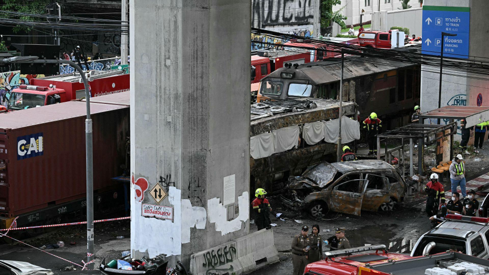 Freight train and bus crash kills at least eight in Bangkok