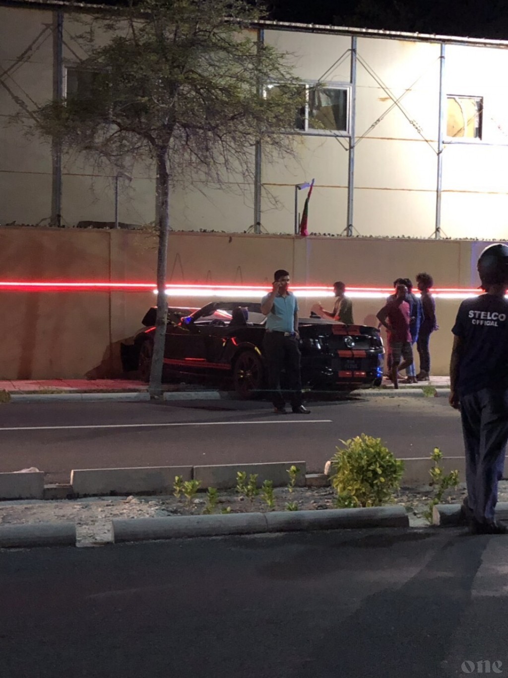 Speeding car loses control, hits wall