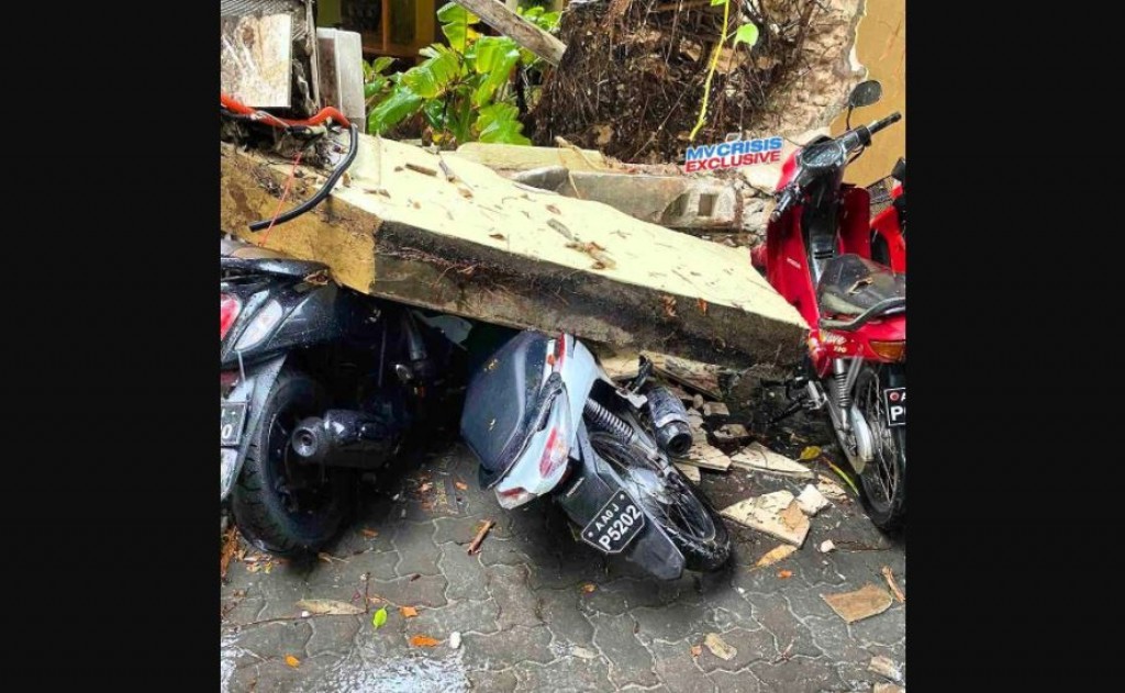 Restaurant wall falls damaging motorcycles
