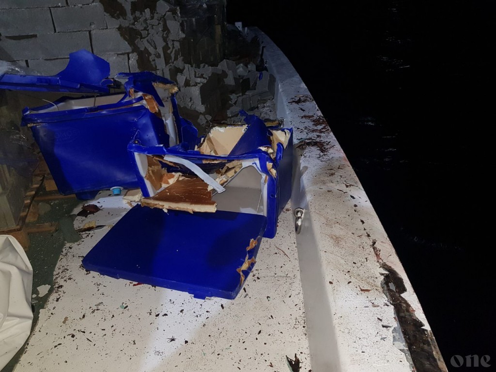 Boat collides with cargo vessel