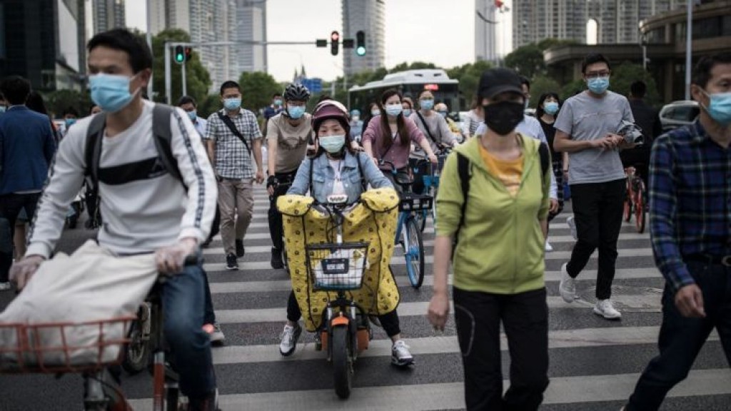 China reports 57 new COVID-19 cases, lockdowns imposed in parts of Beijing