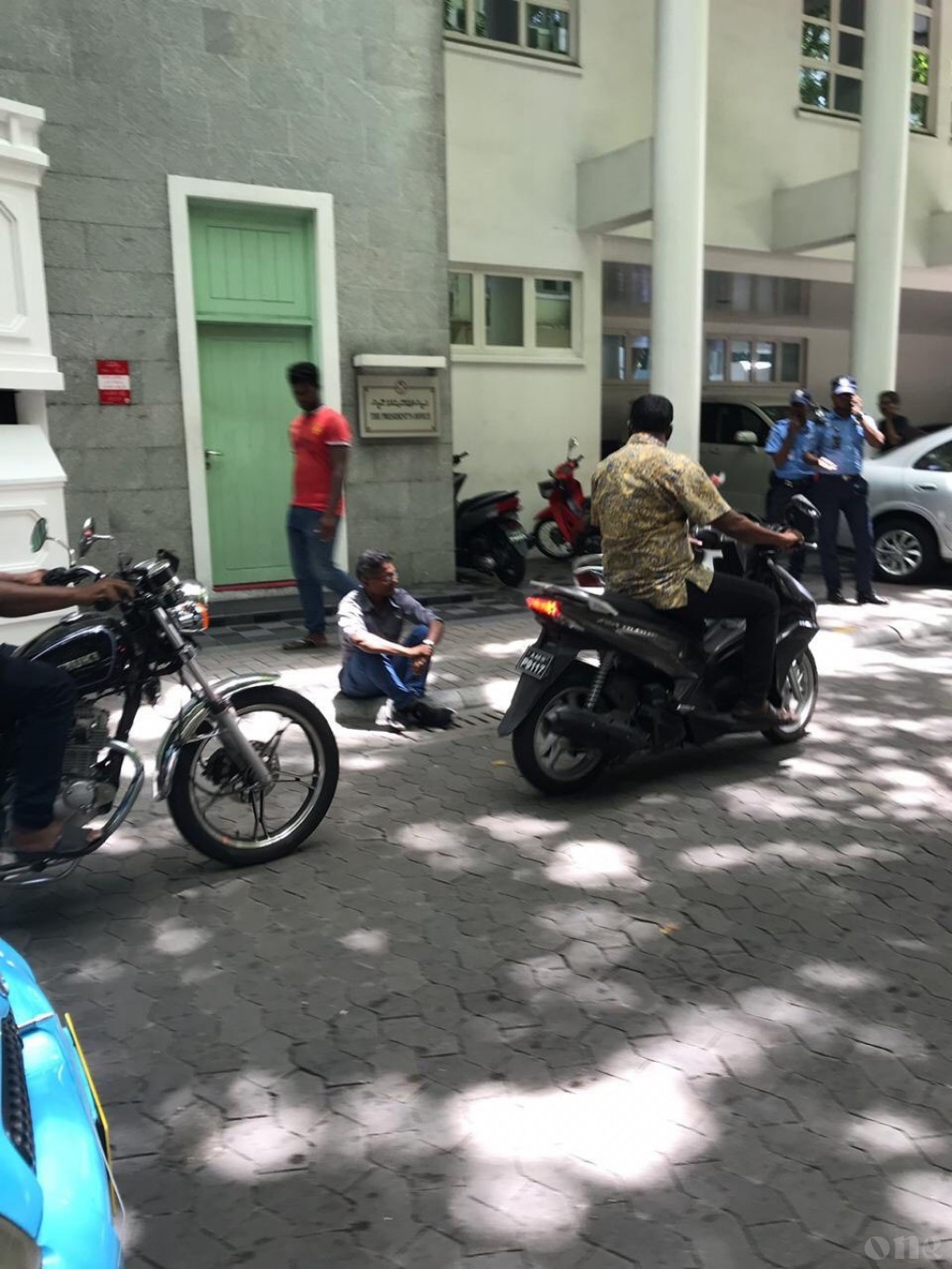 Man sitting outside President’s Office taken into police custody