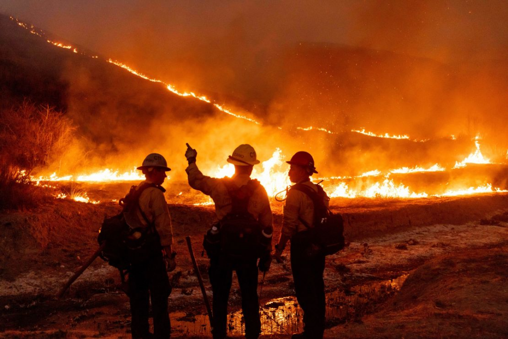 Los Angeles investigates fire blame as curfew enforced