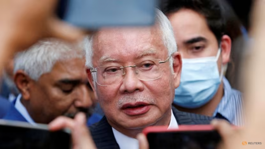 Former Malaysian premier Najib Razak’s jail term halved from 12 to 6 years