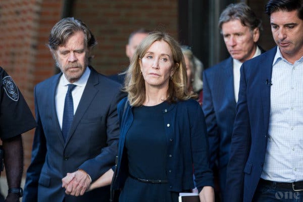 Actress Felicity Huffman sentenced to 14 days in jail over US college scandal