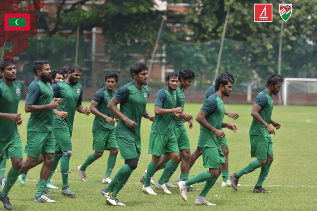 Qualification match thakah China ah dhiyumuge kurin gaumee team camp koffi