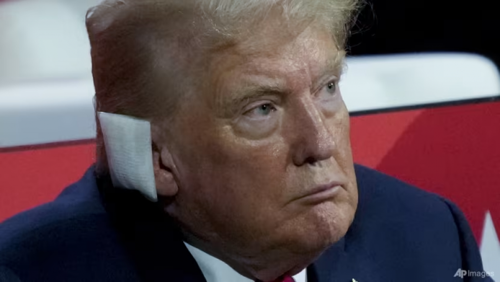 Trump, ear bandaged, appears at Republican National Convention