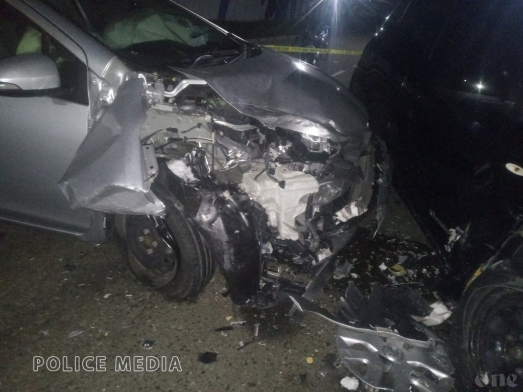 Two cars sustain massive damage in traffic collision
