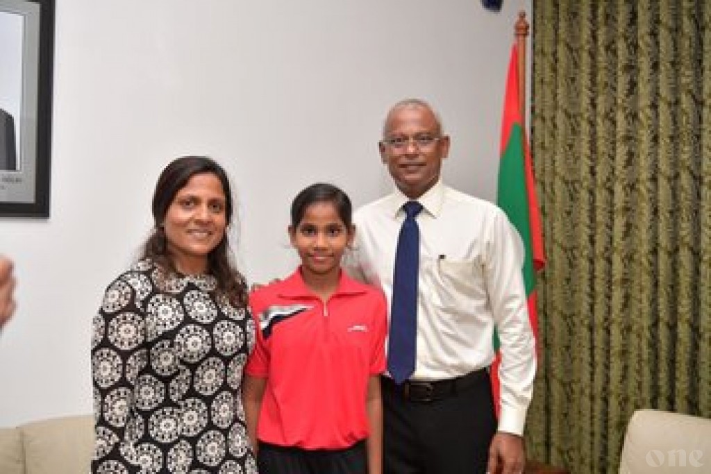 President and First Lady meets 11-year-old gold medalist, Dheema