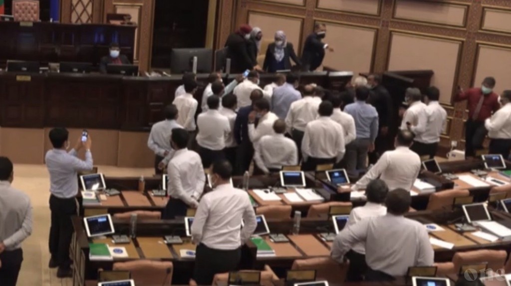 Chaos in Parliament breaks distancing rules as confrontation gets physical