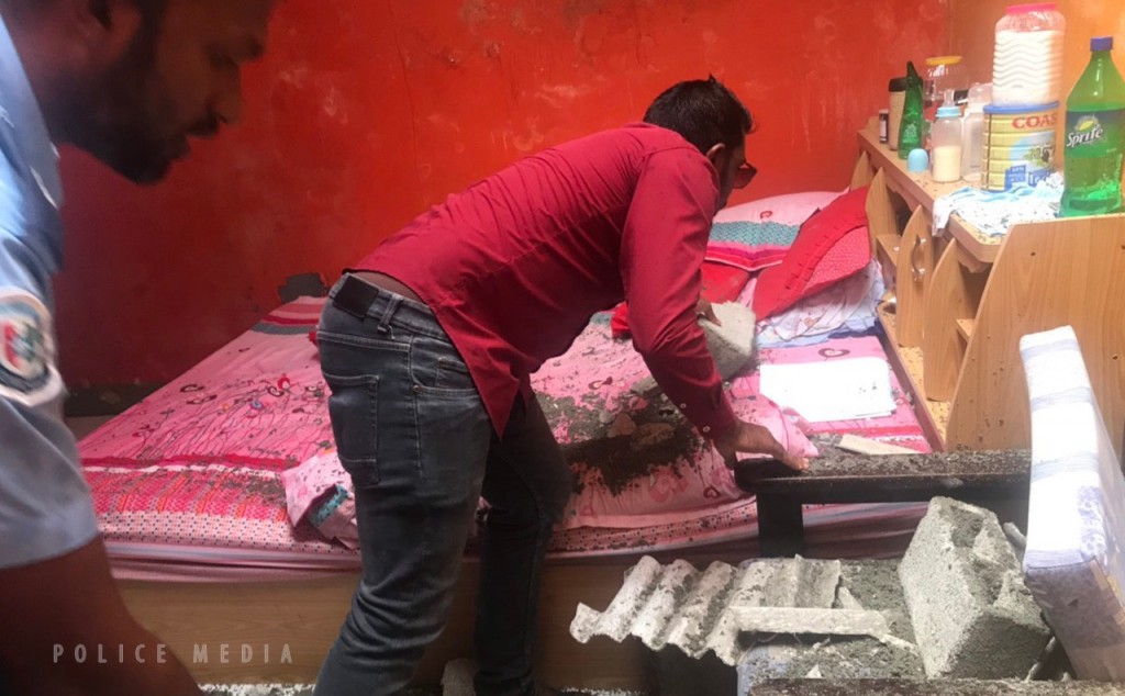 Child injured after wall collapses inside a room