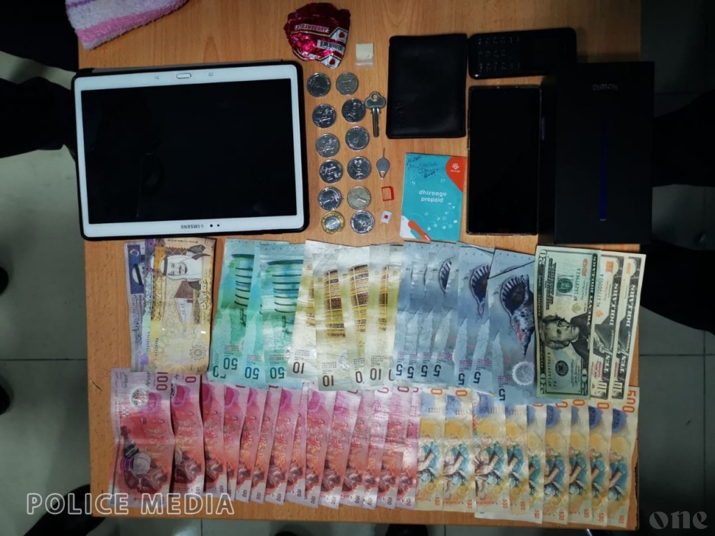 Man arrested with drugs and stolen money