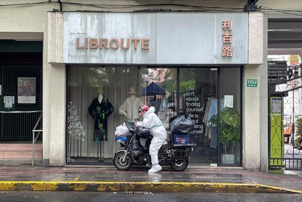 Shanghai fences up COVID-hit buildings, fuelling fresh outcry