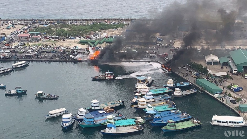 Fire on speed boat and fuel barge at T-Jetty