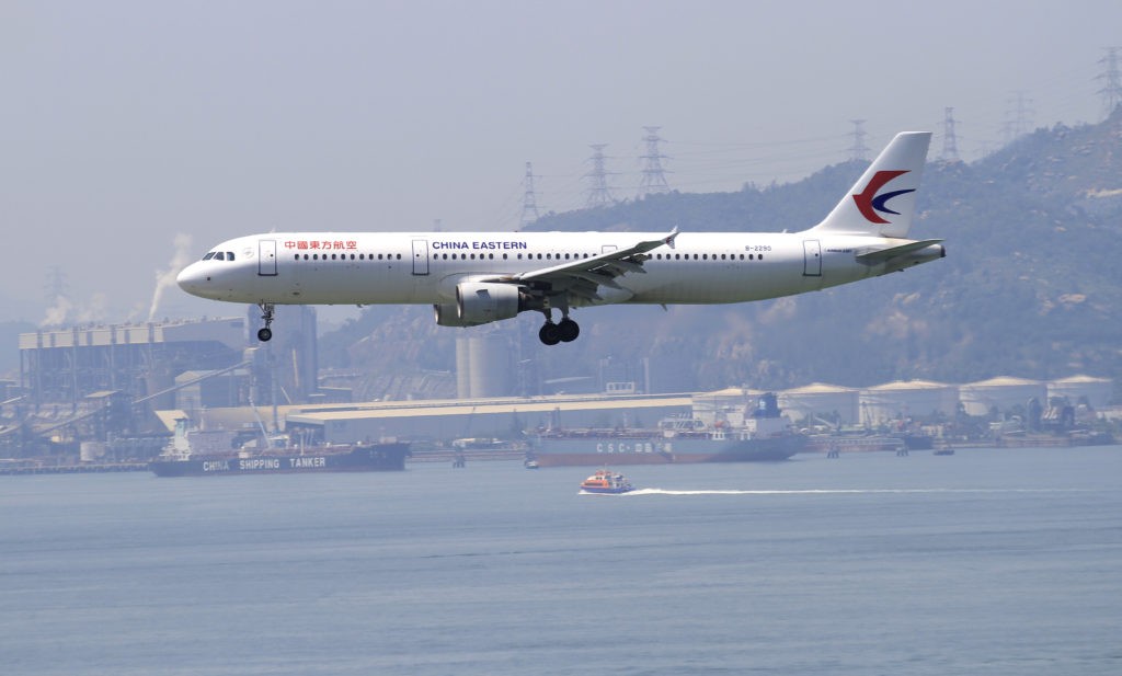 China shortens suspensions for international flights linked to COVID-19 cases