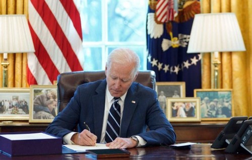 Biden boosts US COVID-19 vaccine stockpile as world waits