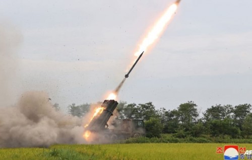 North Korea test-fires rocket launcher with new guide system