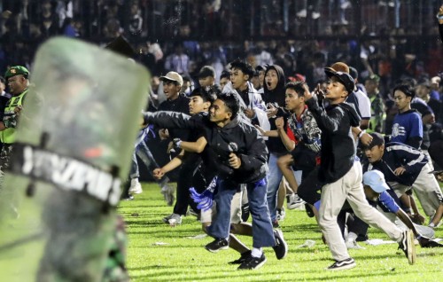 Stampede, riot at Indonesia football match kill at least 125, league suspended