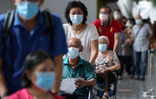 Malaysia pauses transition to COVID-19 endemic phase over new Omicron variant