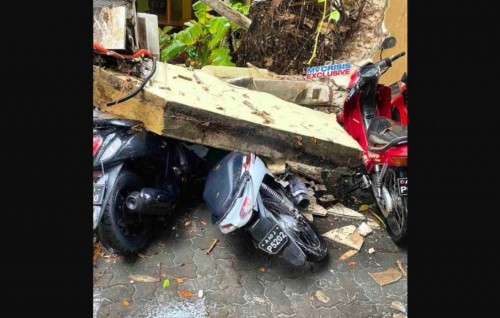 Restaurant wall falls damaging motorcycles