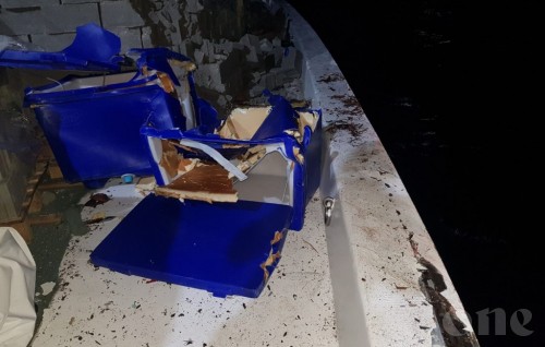 Boat collides with cargo vessel