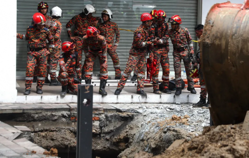 Search for woman swallowed by 8m sinkhole now 'too risky'