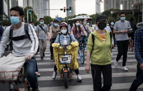 China reports 57 new COVID-19 cases, lockdowns imposed in parts of Beijing