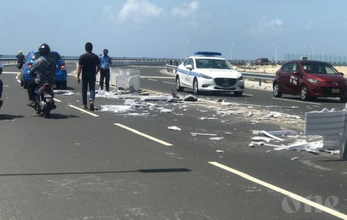 Traffic collision on bridge highway, dividers destroyed