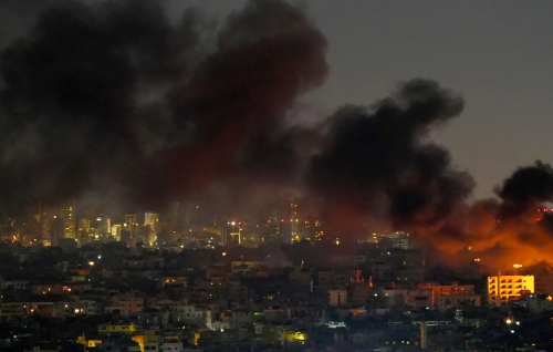 Blasts heard in Lebanon as Israel vows to hit banks