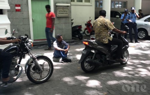 Man sitting outside President’s Office taken into police custody