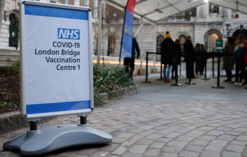 Britain hits milestone as half of all adults get first vaccine dose
