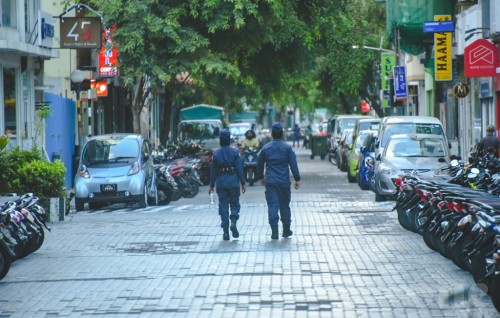 Two arrested for making death threats against police officers