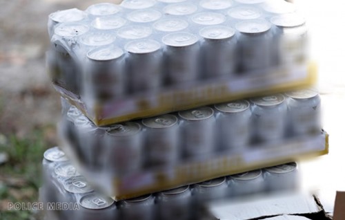 Three arrested after large amount of alcohol found in taxi