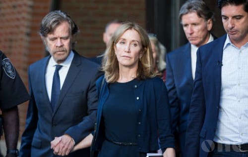 Actress Felicity Huffman sentenced to 14 days in jail over US college scandal