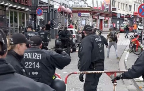 German police shoot axe-wielding man at Hamburg football fan parade