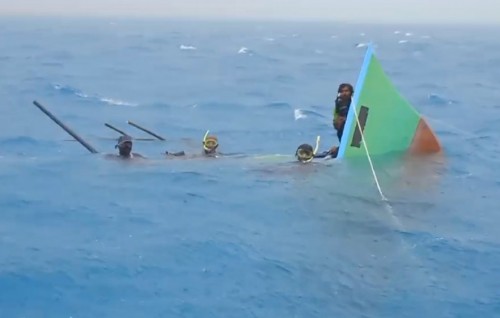 Boat out for Grouper fishing sinks with five