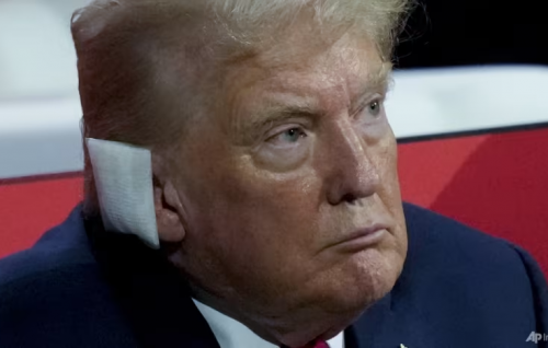 Trump, ear bandaged, appears at Republican National Convention
