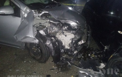 Two cars sustain massive damage in traffic collision