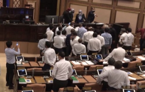 Chaos in Parliament breaks distancing rules as confrontation gets physical