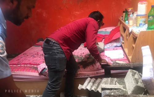 Child injured after wall collapses inside a room