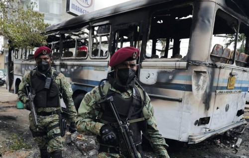 Sri Lankan troops ordered to open fire on looters and vandals as protests continue
