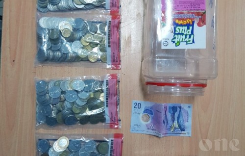Man arrested while stealing from coin box