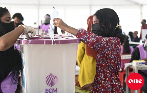 Covid ah positive meehun vote laan 1 gadi iru