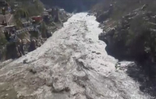 Dozens feared dead as Himalayan glacier breaks in India, flooding sweeps into dams