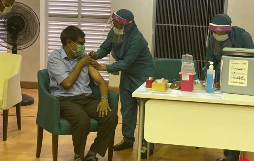 Chief Justice Muthasim Adnan receives COVID vaccine