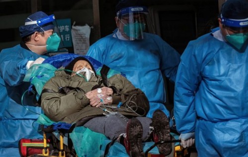 Chinese hospitals 'extremely busy' as COVID-19 spreads unchecked