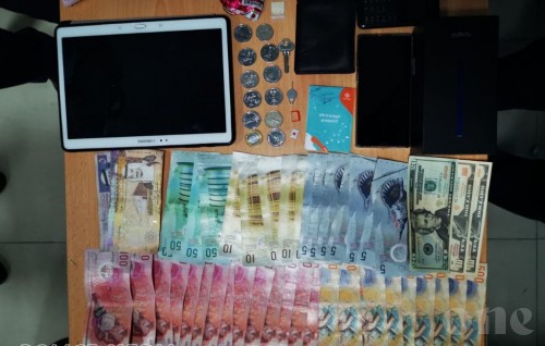 Man arrested with drugs and stolen money