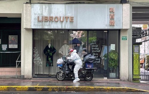 Shanghai fences up COVID-hit buildings, fuelling fresh outcry