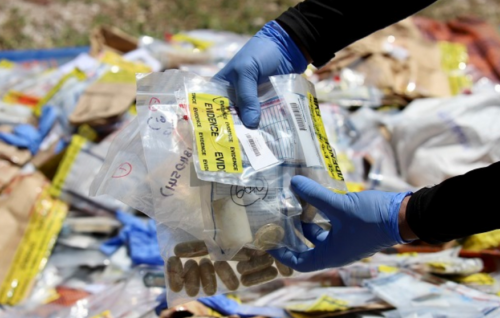 Three houses searched, two arrested with illegal drugs and money