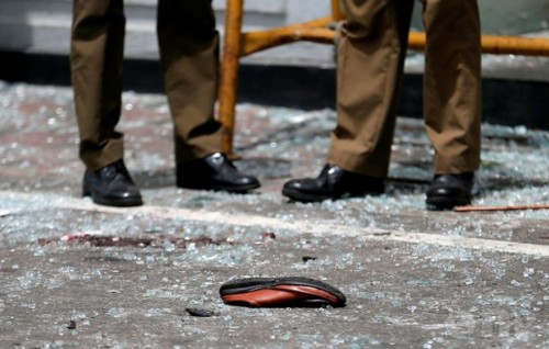 Three arrested with swords, a hand grenade and suspected explosives